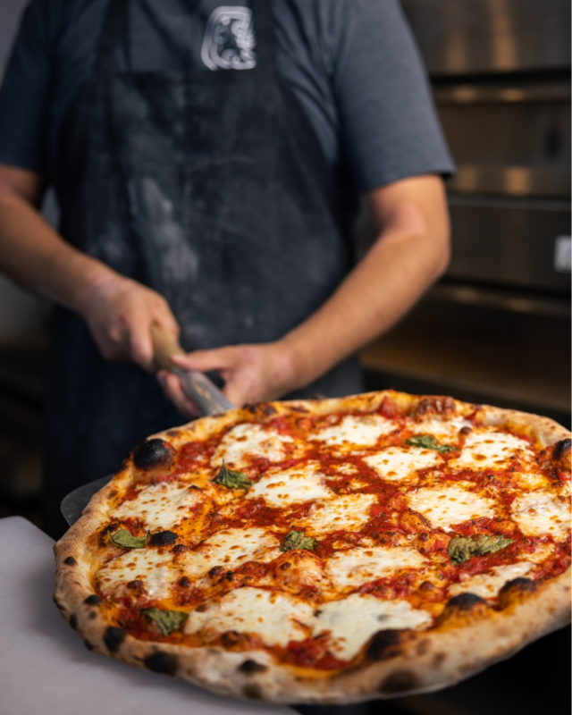 Cooked to perfection and bursting with flavor! 🍕 Our pizzas are the freshest and most authentic in town—one bite, and you'll taste the difference.