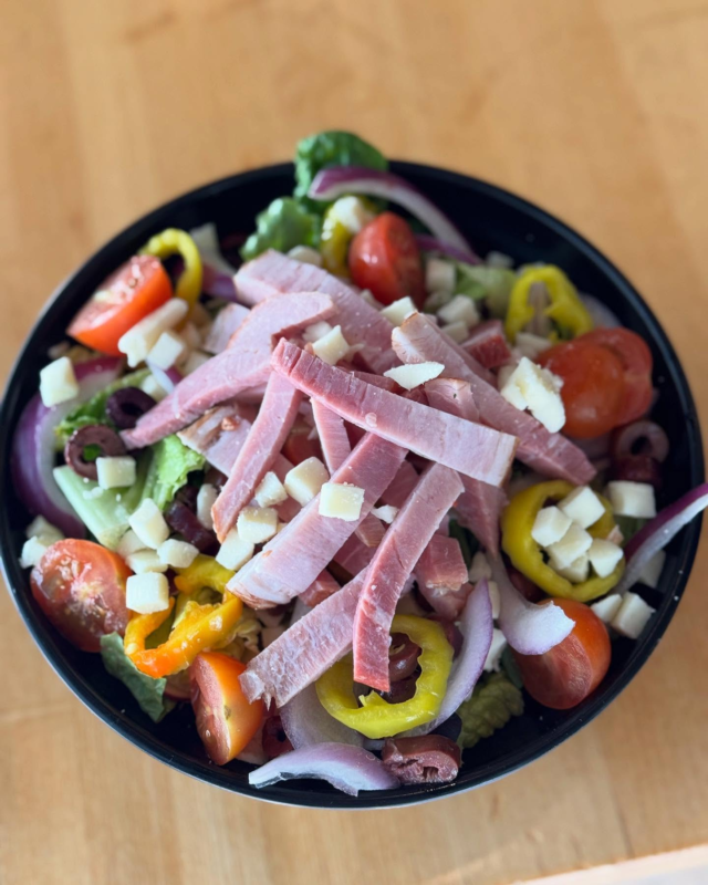 Lunch plans ✅We are now offering a FRESH House Salad 🌿 Local salad mix, red onion, olives, tomatoes, banana peppers, and mozzarella cheese!Optional protein add-on: sliced ham (pictured), pepperoni, or chicken.